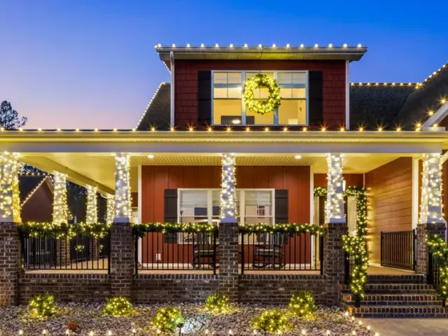 Porch rail and roofline lit together